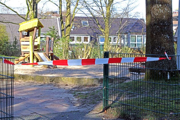 Fear of the corona virus A childrens playground has been closed due to the corona crisis and may no longer be used Essen North Rhine-Westphalia Germany