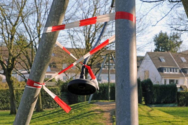 Fear of the corona virus A childrens playground has been closed due to the corona crisis and may no longer be used Essen North Rhine-Westphalia Germany