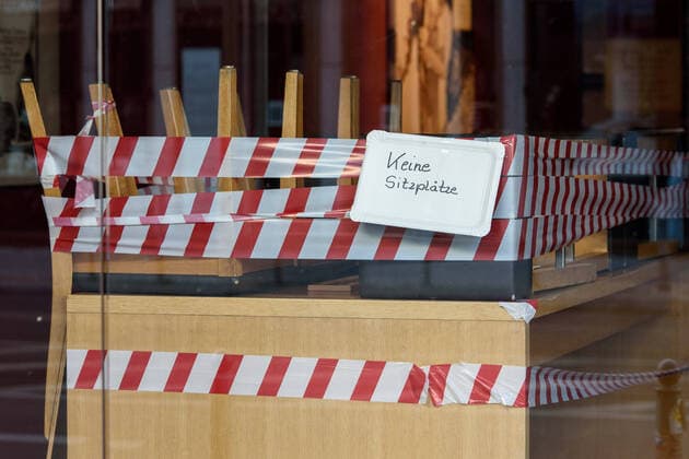 Coronavirus, impressions of the exit restrictions in Berlin Germany, Berlin 24 03 2020 In the picture you can see chairs wrapped with barrier tape in a shop with a sign no seats Berlin Berlin Germany