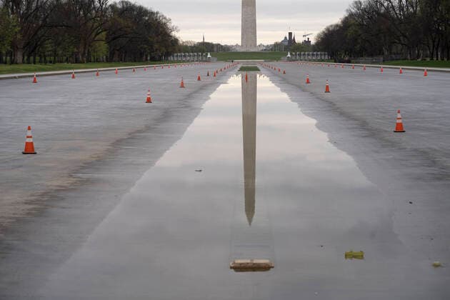 March 24, 2020, Washinton, District of Columbia, USA: The Washington Monument is reflected in a puddle in the drained Lincoln Memorial Reflecting Pool on Tuesday, March 24, 2020, in Washington, District of Columbia. Washinton USA - ZUMAg214 20200324_znp_g214_013 Copyright: xSaitxSerkanxGurbuzx