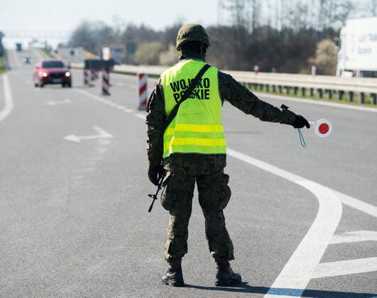 Sanitary Control Point at the Polish-German border in Kolbaskowo Sanitary Control Point at the Polish-German border on March 24, 2020 in Kolbaskowo, Poland Soldiers and members of sanitary services check all the returning drivers due to the coronavirus outbreak. EN_01420817_0031 