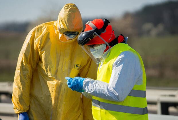 Sanitary Control Point at the Polish-German border in Kolbaskowo Sanitary Control Point at the Polish-German border on March 24, 2020 in Kolbaskowo, Poland Soldiers and members of sanitary services check all the returning drivers due to the coronavirus outbreak. EN_01420817_0043 