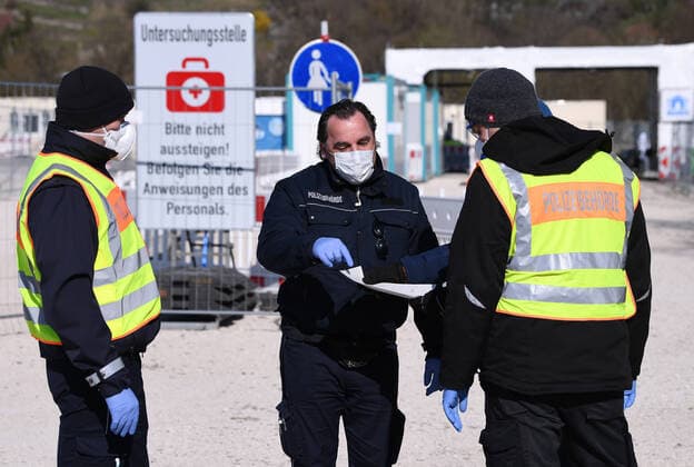Tuebingen 24 03 2020 Corona Container Ambulance Tuebingen Covid 19 Supply on the Tuebingen fairground Staff of the public order office organize the access to the examination site ULMER