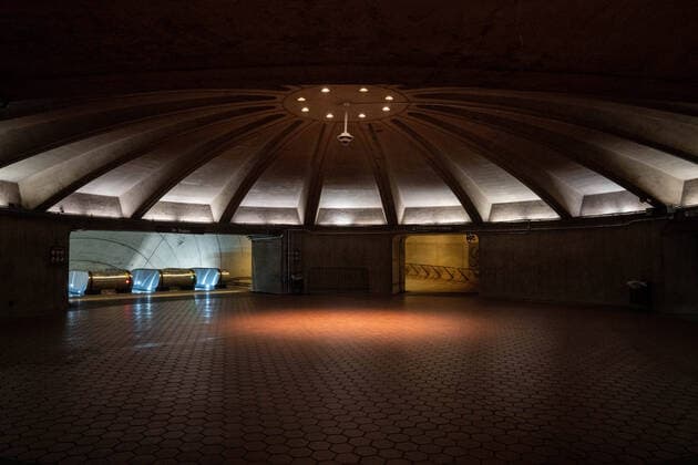 March 24, 2020, Washington, DC, UNITED STATES: An empty entrance to the Friendship Heights metro station in mid day in Washington, DC on Tuesday, March 24, 2020. To date the United States has 52,966 Corona Virus cases and 685 deaths. President Donald Trump says he wants the nation opened up and just raring to go by Easter -- a date just more than two weeks away that few health experts believe will be sufficient in containing the spread of coronavirus. Washington UNITED STATES - ZUMAc206 20200324_zap_c206_006 Copyright: xKenxCedenox