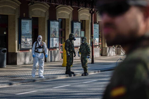 March 24, 2020, San Sebastian, Basque Country, Spain: Soldiers in protective suits as a preventive measure, ready for the disinfection work during the corona virus pandemic..62 soldiers from the Spanish Army disinfected the San Sebastian train station in the Basque County, as a preventive measure against the spread of the coronavirus San Sebastian Spain - ZUMAs197 20200324_zaa_s197_156 Copyright: xJavixJuliox