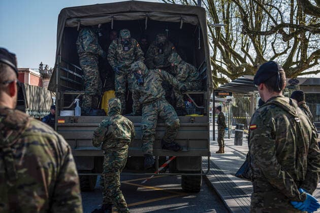March 24, 2020, San Sebastian, Basque Country, Spain: Soldiers in protective suits as a preventive measure arrive for the disinfection work during the corona virus pandemic..62 soldiers from the Spanish Army disinfected the San Sebastian train station in the Basque County, as a preventive measure against the spread of the coronavirus San Sebastian Spain - ZUMAs197 20200324_zaa_s197_158 Copyright: xJavixJuliox