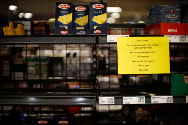Düsseldorf, Germany, sign on an almost empty goods shelf in the REWE store Yade in Düsseldorf on 24 03 2020