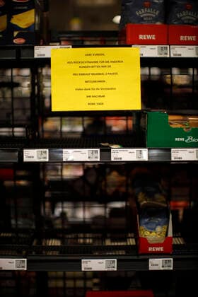 Düsseldorf, Germany, sign on an almost empty goods shelf in the REWE store Yade in Düsseldorf on 24 03 2020