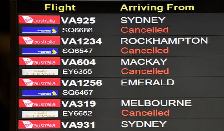 VIRGIN AUSTRALIA WORKERS STOOD DOWN, A domestic arrivals board showing cancelled flights is seen at the Brisbane domestic Airport in Brisbane, Wednesday, March 25, 2020. Virgin Australia has announced it is standing down around 8,000 of its 10,000 workers and will be cutting its domestic capacity by 90 per cent. ( NO ARCHIVING, EDITORIAL USE ONLY, NO USE IN BOOKS WITHOUT CONSENT BRISBANE QLD AUSTRALIA  Copyright: xDARRENxENGLANDx 20200325001459253906
