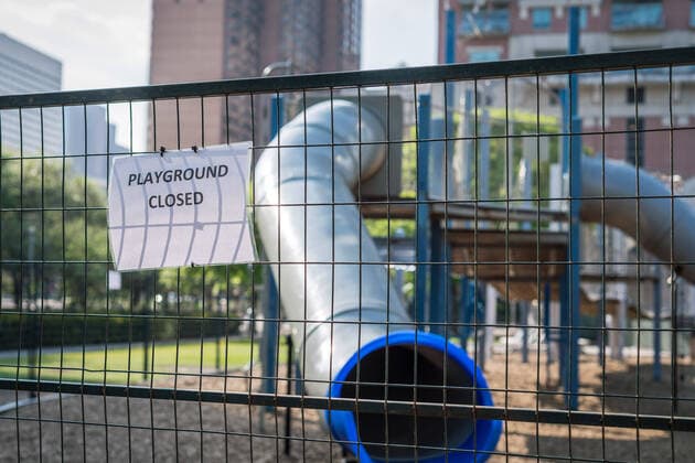 March 24, 2020, Houston, Texas, USA: Maintenance workers put up signs and fence off playgrounds and furniture at DISCOVERY GREEN in downtown Houston, Texas, Tuesday, March 24, 2020. A Stay Home - Work Safe Order was issued Tuesday for Houston and Harris County residents to help fight the spread of COVID-19. The order will go into effect at 11:59 p.m. and will last until April 3. Houston USA - ZUMAp213 20200324_znp_p213_003 Copyright: xLynnxPenningtonx