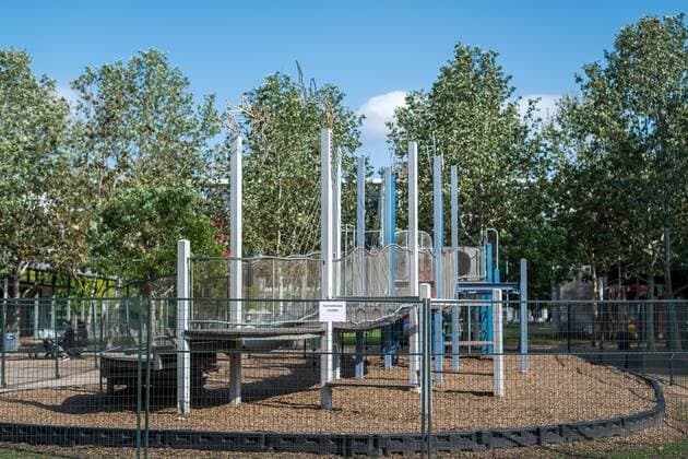 March 24, 2020, Houston, Texas, USA: Maintenance workers put up signs and fence off playgrounds and furniture at DISCOVERY GREEN in downtown Houston, Texas, Tuesday, March 24, 2020. A Stay Home - Work Safe Order was issued Tuesday for Houston and Harris County residents to help fight the spread of COVID-19. The order will go into effect at 11:59 p.m. and will last until April 3. Houston USA - ZUMAp213 20200324_znp_p213_004 Copyright: xLynnxPenningtonx