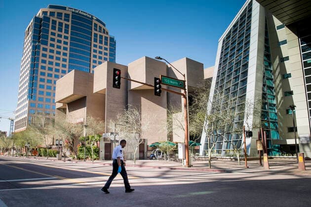 March 24, 2020, Phoenix, Arizona, U.S: The Phoenix Convention Center security remian on duty at the normally a bustling event center, that sits dormant as many businesses in the state were ordered closed and many others elected to work remotely in response the rapid spread of Covid-19 Corona Virus, March 24, 2020. Phoenix U.S. - ZUMAd90_ 20200324_zap_d90_009 Copyright: xRickxD™Eliax