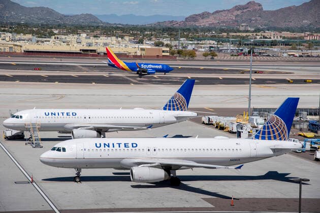March 24, 2020, Phoenix, Arizona, U.S: Aircraft sit parked in storage a Sky Harbor International Airport in Phoenix, Arizona, as people worldwide stay home in large numbers in an attempt to slow the rapid spread of Covid-19 Corona Virus, March 24, 2020. Phoenix U.S. - ZUMAd90_ 20200324_zap_d90_025 Copyright: xRickxD™Eliax