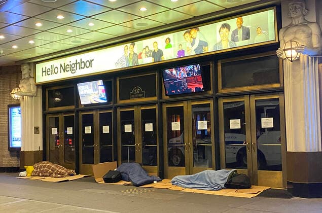 NEW YORK, NY - MARCH 24: Homeless seen sleeping through the evening at Times Square Church during the coronavirus pandemic in New York City on March 24, 2020. Copyright: xRainmakerxPhotox