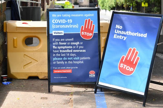 AUSTRALIA CORONAVIRUS COVID-19, Staff wearing face masks outside the Royal Prince Alfred Hospital (RPA) in Camperdown, Sydney, Wednesday, March 25, 2020. The government has announced that all elective surgery will be postponed in order to free up hospital beds and staff to deal with the COVID-19 Coronavirus pandemic.( NO ARCHIVING, EDITORIAL USE ONLY, NO USE IN BOOKS WITHOUT CONSENT SYDNEY NSW AUSTRALIA  Copyright: xDEANxLEWINSx 20200325001459305151