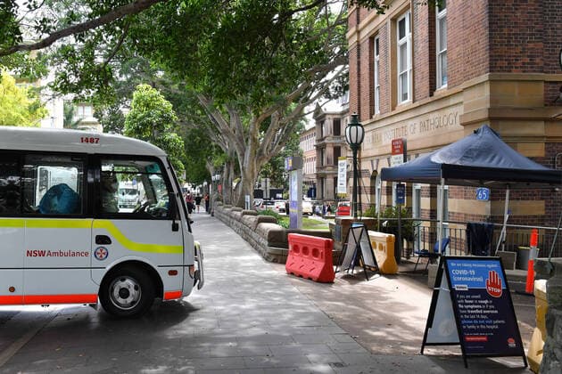 AUSTRALIA CORONAVIRUS COVID-19, A NSW Ambulance mini bus arrives at Royal Prince Alfred Hospital (RPA) in Camperdown, Sydney, Wednesday, March 25, 2020. The government has announced that all elective surgery will be postponed in order to free up hospital beds and staff to deal with the COVID-19 Coronavirus pandemic.( NO ARCHIVING, EDITORIAL USE ONLY, NO USE IN BOOKS WITHOUT CONSENT SYDNEY NSW AUSTRALIA  Copyright: xDEANxLEWINSx 20200325001459307428