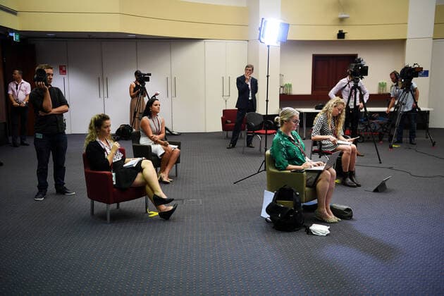 ANNASTACIA PALASZCZUK COVID-19 PRESSER, Journalists keep their distance from each other during a press conference with Queensland Premier Annastacia Palaszczuk at Parliament House in Brisbane, Wednesday, March 25, 2020. A shutdown of non-essential services as well as domestic and international travel restrictions are in effect Australia wide in a bid to slow the spread of the COVID-19 coronavirus. ( NO ARCHIVING, EDITORIAL USE ONLY, NO USE IN BOOKS WITHOUT CONSENT BRISBANE QUEENSLAND AUSTRALIA  Copyright: xDANxPELEDx 20200325001459424922