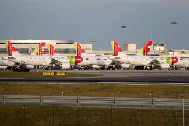 (200325) -- LISBON, March 25, 2020 -- Aircrafts of TAP Air Portugal sit on the Humberto Delgado Airport amid the spread of COVID-19, in Lisbon, Portugal on March 24, 2020. COVID-19, caused by the novel coronavirus, has infected 2,362 people and killed 33 in Portugal, according to the latest from the health authorities. (Photo by Xinhua) PORTUGAL-LISBON-COVID-19 PedroxFiuza 