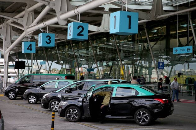 (200325) -- LISBON, March 25, 2020 -- Taxi drivers wait for clients at the Humberto Delgado Airport, amid the spread of COVID-19, in Lisbon, Portugal on March 24, 2020. COVID-19, caused by the novel coronavirus, has infected 2,362 people and killed 33 in Portugal, according to the latest from the health authorities. (Photo by Xinhua) PORTUGAL-LISBON-COVID-19 PedroxFiuza