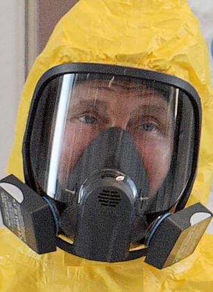 MOSCOW, RUSSIA - MARCH 24, 2020: Russia s President Vladimir Putin wears a protective suit on his visit to the Novomoskovsky multipurpose medical center for patients suspected of the COVID-19 coronavirus infection. Alexei Druzhinin Russian Presidential Press and Information Office TASS  TS0D340F