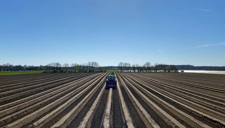 Tractor on asparagus field in Cologne Merkenich