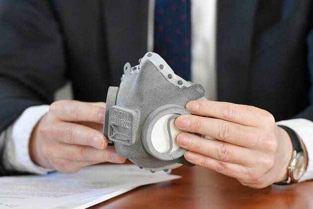 Zdenek Peroutka, dean of the University of West Bohemia (ZUC), shows a top class respirator made with 3D print technology during a press conference, on March 24, 2020, in Pilsen, Czech Republic. The respirator was developed by experts from the Czech Technical University (CVUT) in Prague in cooperation with experts from Faculty of Electrical Engineering of the ZUC. (CTKxPhoto MiroslavxChaloupka) CTKPhotoP202003240550301 cha0003