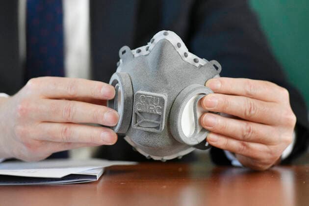 Zdenek Peroutka, dean of the University of West Bohemia (ZUC), shows a top class respirator made with 3D print technology during a press conference, on March 24, 2020, in Pilsen, Czech Republic. The respirator was developed by experts from the Czech Technical University (CVUT) in Prague in cooperation with experts from Faculty of Electrical Engineering of the ZUC. (CTKxPhoto MiroslavxChaloupka) CTKPhotoP202003240550401 cha0004