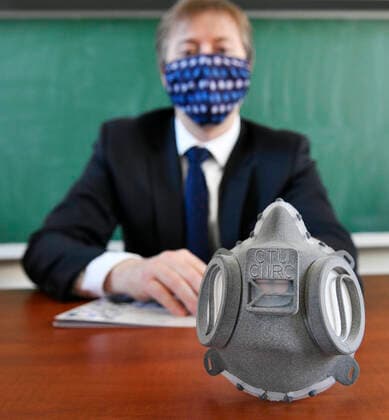 Zdenek Peroutka, dean of the University of West Bohemia (ZUC), shows a top class respirator made with 3D print technology during a press conference, on March 24, 2020, in Pilsen, Czech Republic. The respirator was developed by experts from the Czech Technical University (CVUT) in Prague in cooperation with experts from Faculty of Electrical Engineering of the ZUC. (CTKxPhoto MiroslavxChaloupka) CTKPhotoP202003240551001 cha0005