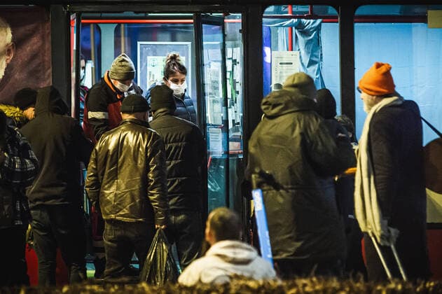 Special SOS Bus in Sopot helps homeless during the coronavirus outbreak Special SOS Bus with a paramedic and some voluntters on the board deliver hot meals and warm clothing to homeless during the coronavirus outbreak on March 24, 2020 in Sopot, Poland. EN_01421673_0011 