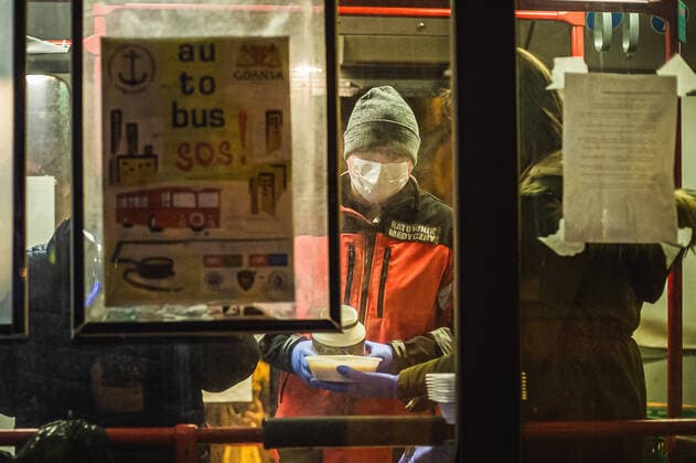 Special SOS Bus in Sopot helps homeless during the coronavirus outbreak Special SOS Bus with a paramedic and some voluntters on the board deliver hot meals and warm clothing to homeless during the coronavirus outbreak on March 24, 2020 in Sopot, Poland. EN_01421673_0017 
