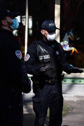Paris, France, March 19, 2020 - Atmosphere in the streets of Paris after the head of state ordered people to stay home to stop the spread of Covid-19 - Police men wearing masks are conducting checks in the streets of the capital. They can impose a fine if people don t respect the rules of confinement.  Copyright: xAlexisxSciardx