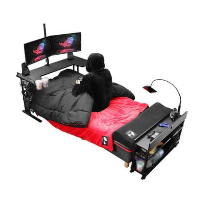 March 25, 2020: A Japanese furniture company have created the perfect coronavirus lockdown set-up with a gaming bed that has room for food and drinks...Video game addicts can now play, eat, drink and nap all without ever leaving their bed...The Ã‚Â£450 gaming bed by Bauhutte means gamers can play non-stop without having to leave for interruptions like eating or sleeping - only the call of nature might lure them away as the bed does not currently feature a bathroom... I wake up and move from my bed to my desk. Why is that so complicated? gaming furniture outfit Bauhutte says in promotions for the bed on its website... Gaming beds solve this problem. ..The bed comes with a desk that can support video screens, an elevating headboard and a headphone hanger...A metallic arm attached to the bed can mount a tablet screen above a person s fa - ZUMAc218 20200325_zia_c218_003 Copyright: xCOVERxImagesx