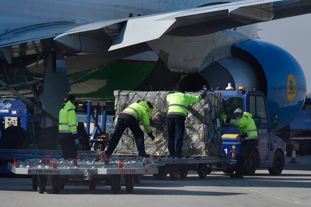 Aircraft landed at the Mosnov - Ostrava airport with supply of medical equipment from China aimed to help tackle the coronavirus epidemic in the Czech Republic, March 25, 2020. (CTKxPhoto JaroslavxOzana) CTKPhotoP202003250320701 JAO 05