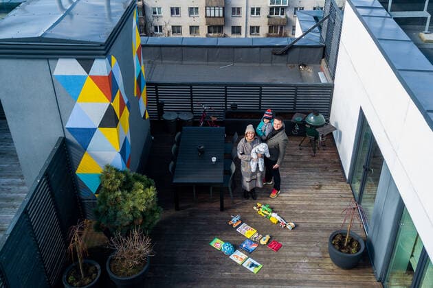 March 24, 2020, Vilnius, Lithuania: ALL PHOTOS WERE TAKEN WITH CONSENT AND WITH PERMISSION TO SHARE IMAGES**..A photographer has used his drone to capture images of people quarantined in their homes during the coronavirus pandemic...The heartwarming photos show how Lithuanian families are spending their time in lockdown, away from the outside world...Photographer Adas Vasiliauskas explained how due the cancellation of his usual advertising photography jobs he decided to make the most of social distancing and show how people are brought together in a time of isolation...Adas explains: At first I thought of offering to shoot people with a telephoto lens, but then I remembered I use a drone in my wedding photography and the drone is a totally zero-human-contact way to capture things. .. I shot a few of my friends, the photos gained a lot - ZUMAc218 20200324_zia_c218_054 Copyright: xCOVERxImagesx