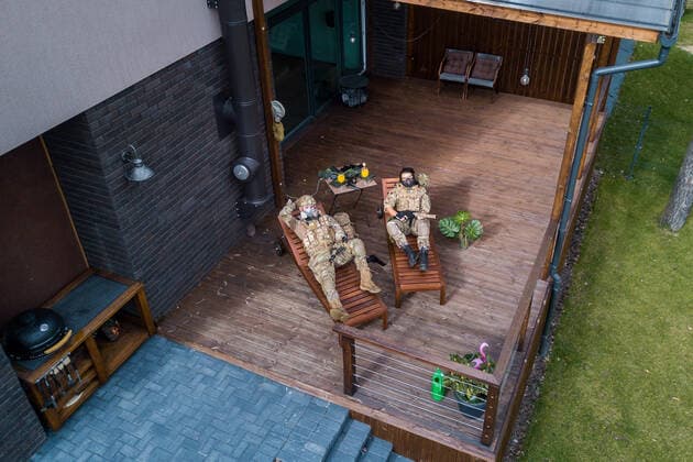 March 24, 2020, Vilnius, Lithuania: ALL PHOTOS WERE TAKEN WITH CONSENT AND WITH PERMISSION TO SHARE IMAGES**..A photographer has used his drone to capture images of people quarantined in their homes during the coronavirus pandemic...The heartwarming photos show how Lithuanian families are spending their time in lockdown, away from the outside world...Photographer Adas Vasiliauskas explained how due the cancellation of his usual advertising photography jobs he decided to make the most of social distancing and show how people are brought together in a time of isolation...Adas explains: At first I thought of offering to shoot people with a telephoto lens, but then I remembered I use a drone in my wedding photography and the drone is a totally zero-human-contact way to capture things. .. I shot a few of my friends, the photos gained a lot - ZUMAc218 20200324_zia_c218_047 Copyright: xCOVERxImagesx