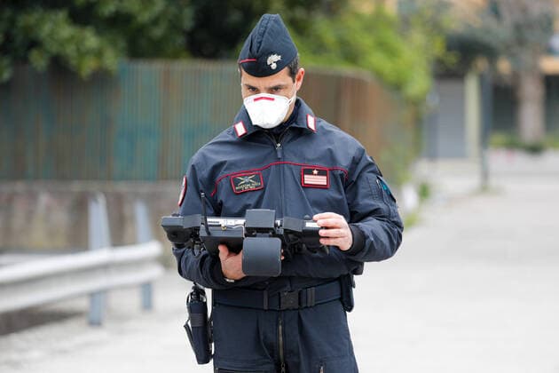 March 25, 2020, Naples, CAMPANIA, ITALY: 03 25 2020 Naples, Scampia district, the carabinieri and the helicopters department of Pontecagnano have presented the new drones that will serve for the control of the gatherings by citizens during the quarantine for the emergency from covid-19 virus Naples ITALY - ZUMAs236 20200325_zap_s236_042 Copyright: xFabioxSassox