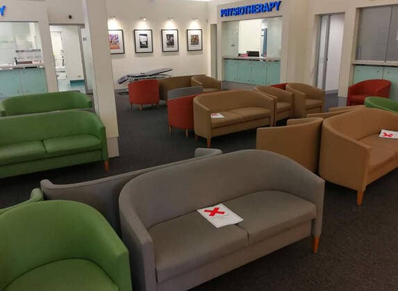 (200325) -- MELBOURNE, March 25, 2020 (Xinhua) -- Mobile photo shows social distancing signs on couches at a clinic in Melbourne, Australia, March 24, 2020. As of 3:00 p.m. local time Wednesday, there are 2,423 confirmed cases of COVID-19 in Australia, according to the country s Health Department. (Photo by Gui Qing Xinhua) AUSTRALIA-MELBOURNE-COVID-19 