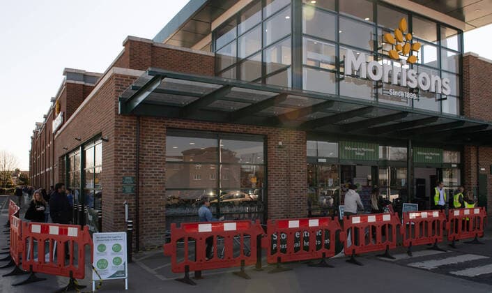 Shoppers queuing outside Morrisons in Sidcup, Kent during the Coronavirus (COVID-19) outbreak where travel has been restricted across the country at Sidcup, England on 25 March 2020. Copyright: xAlanxStanfordx PMI-3450-0001