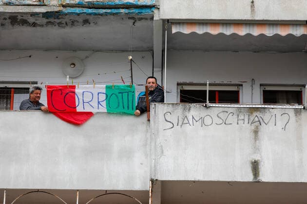 March 25, 2020, Naples, CAMPANIA, ITALY: 3 25 2020 Naples, in the northern suburbs of the Scampia district, the carabinieri weapon checks for quarantine to combat the pandemic of the covid-19 virus Naples ITALY - ZUMAs236 20200325_zap_s236_098 Copyright: xFabioxSassox