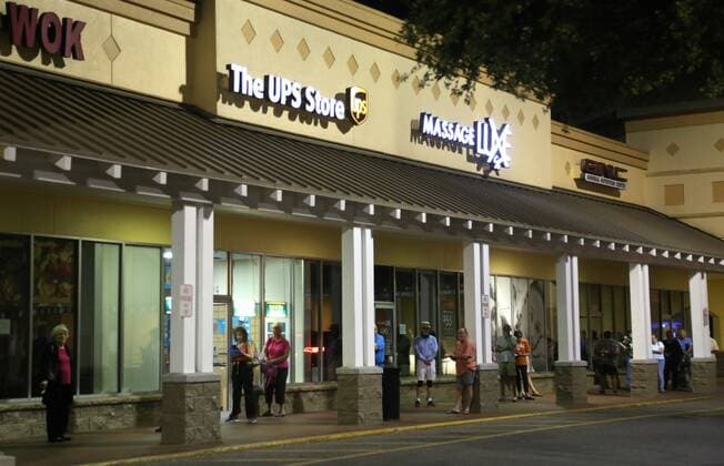 March 25, 2020, St. Petersburg, Florida, USA: Customers wait in line before the opening of the Publix store in the Northeast Park Shopping Center, St. Petersburg, Wednesday, March 25, 2020 at 7am. Publix designated Tuesday and Wednesday mornings, 7-8am as senior shopping hours for customers age 65 and over. St. Petersburg USA - ZUMAs70_ 20200325_zan_s70_002 Copyright: xScottxKeelerx
