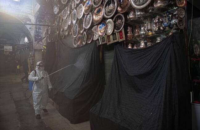 Staff members disinfect historical Grand Bazaar, in Istanbul, Turkey, on March 25, 2020. Turkey has confirmed 44 death and 1,874 positive cases of the coronavirus infection in the country. (Akin Celiktas- Depo Photos) Copyright: AkinxCeliktasx-xDepoxPhotos 16705213