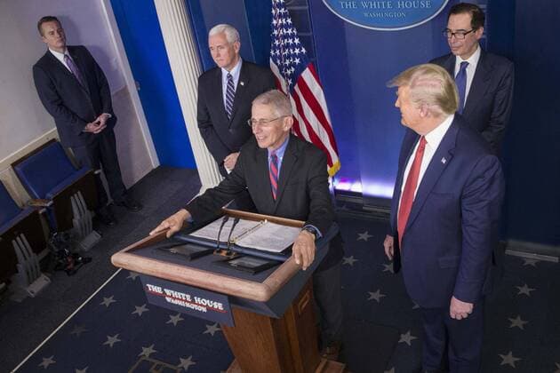 President Donald Trump delivers remarks on the COVID-19 (Coronavirus) pandemic alongside President Donald Trump, Vice President Mike Pence and members of the Coronavirus Task Force in the Brady Press Briefing Room at the White House in Washington, DC, March 25, 2020, in Washington, D.C.  WAP20200325801 SARAHxSILBIGER