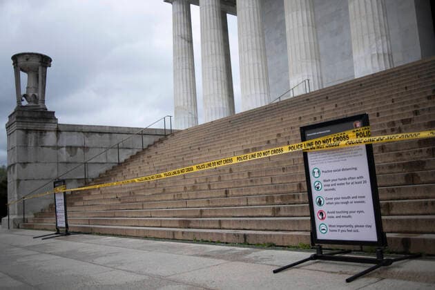 (200326) -- WASHINGTON D.C., March 26, 2020 -- Guidance boards about measures of prevention of COVID-19 are seen in front of the closed Lincoln Memorial in Washington D.C., the United States, March 25, 2020. The number of COVID-19 cases in the United States topped 60,000 as of 3:30 p.m. U.S. Eastern Time on Wednesday (1930 GMT), according to the Center for Systems Science and Engineering (CSSE) at Johns Hopkins University. ) U.S.-WASHINGTON D.C.-COVID-19 LiuxJie 