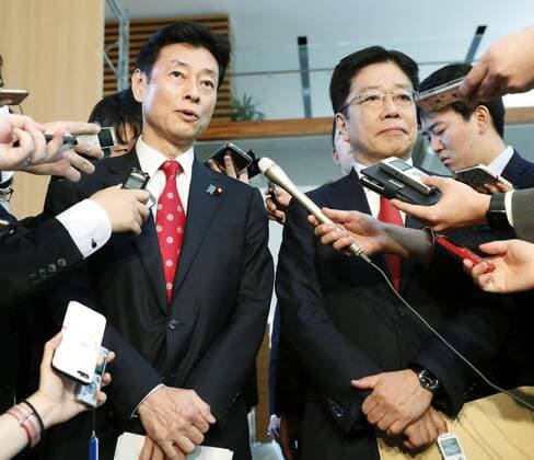 Japan s launch of new coronavirus task force Yasutoshi Nishimura (L), Japan s minister in charge of economic revitalization, and Health Minister Katsunobu Kato meet the media at the prime minister s office in Tokyo on March 26, 2020, ahead of the launch of a new coronavirus task force. A recently revised law enables Prime Minister Shinzo Abe to declare a state of emergency if necessary to cope with the outbreak. 