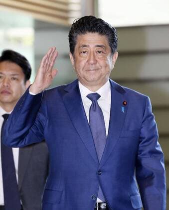 Japan s launch of new coronavirus task force Japanese Prime Minister Shinzo Abe arrives at his office in Tokyo on March 26, 2020, ahead of the launch of a new coronavirus task force. A recently revised law enables Abe to declare a state of emergency if necessary to cope with the outbreak. 