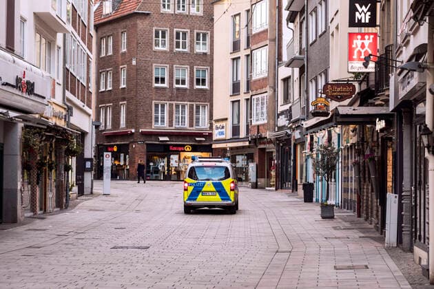 Berger Straße in the old town of Düsseldorf, police patrol checks compliance with measures to combat the coronavirus pandemic