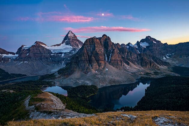 Sunset on top of Nub Peak, looking at Mount Assiniboine and the moon, Mount Assiniboine rises nearly 1525m above Lake Magog, Alberta, Canadian Rockies, Canada, North America Copyright: SamanthaxNew 1322-2