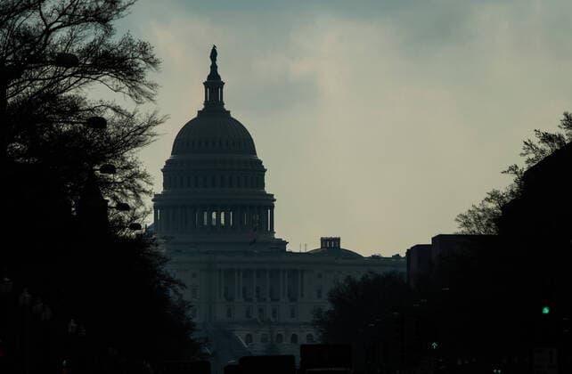 The U.S. Capitol Building is seen after the Senate passed a nearly $2 trillion economic stimulus package, the largest ever, to help ease the economic downturn following the Coronavirus pandemic sweeping the nation, in Washington, D.C on Thursday, March 26, 2020.  WAP20200326303 KEVINxDIETSCH