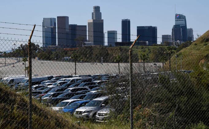 Hundreds of rental cars seen park at Dodger Stadium Thursday, March 26,2020. Los Angels CA USA. Due to the COVID-19 it appears that part of the ballpark property has been turned into a huge rental car storage lot as the rental business dries up during the pandemic. Los Angeles USA - ZUMAbl1_ 20200326_zaf_bl1_001 Copyright: xGenexBlevinsx