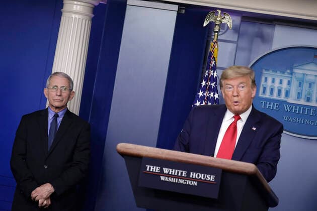 March 26, 2020, Washington, District of Columbia, USA: Director of the National Institute of Allergy and Infectious Diseases Dr. Anthony Fauci, left, listens to United States President Donald J. Trump, right, speaking during a press briefing on the Coronavirus COVID-19 pandemic with members of the Coronavirus Task Force at the White House in Washington on March 26, 2020. ABACAPRESS.COM.Credit: Pool via CNP Washington USA - ZUMAs152 20200326_zaa_s152_011 Copyright: xYurixGripasx